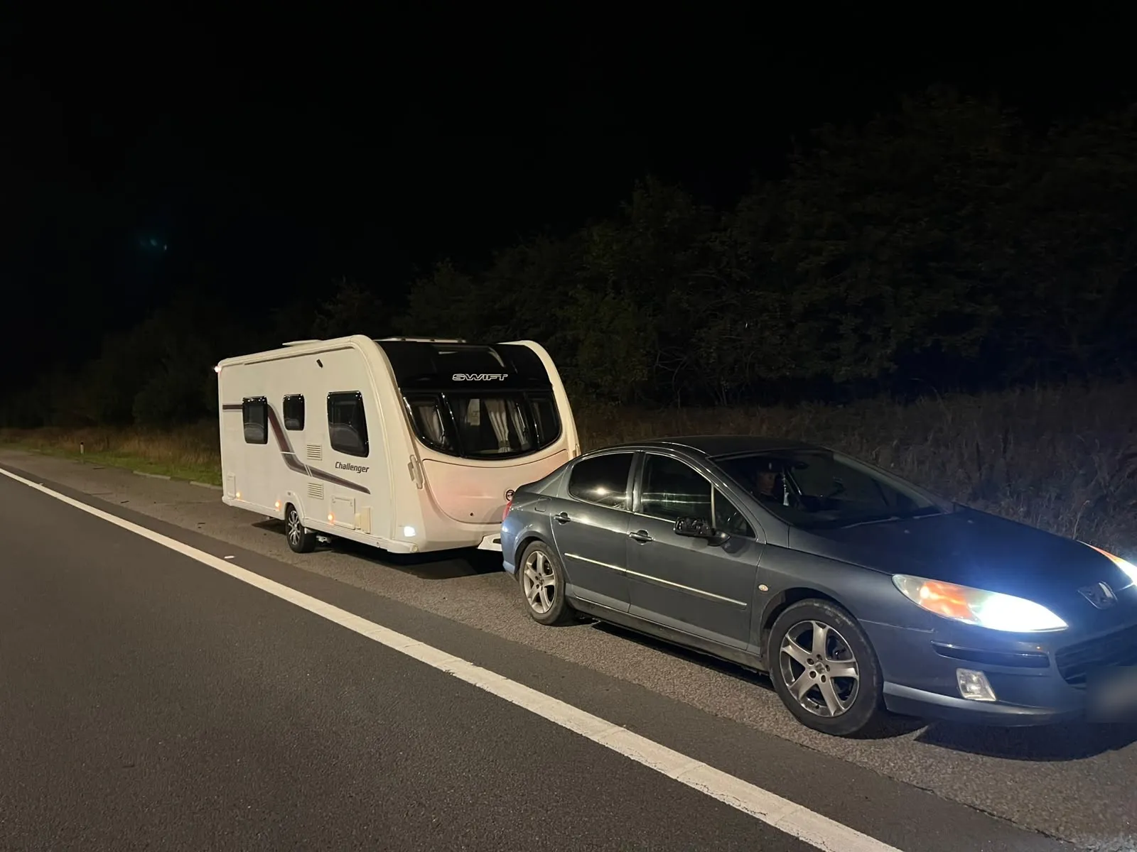 Photo of the Swift Challenger Towed Home at Night